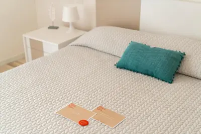 Letto o letti in una camera di Sun Beach Residence con Piscina - Piazza Brescia - Adria Holiday Jesolo - FAMILY APARTMENTS