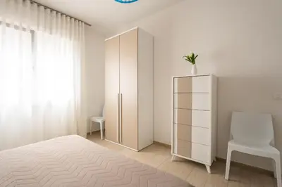 Letto o letti in una camera di Trilocale VI20, Condominio Vicenza - Adria Holiday Jesolo - FAMILY APARTMENT