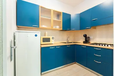 Cucina o angolo cottura di Trilocale VI20, Condominio Vicenza - Adria Holiday Jesolo - FAMILY APARTMENT