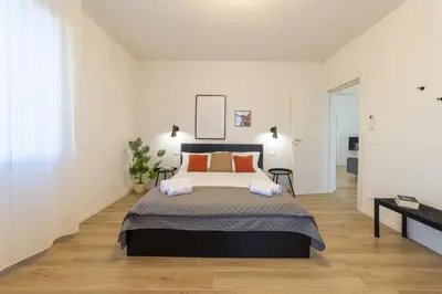 Letto o letti in una camera di ToVenezia Apartment