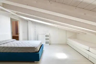 Letto o letti in una camera di Wave Village 2 Apartments
