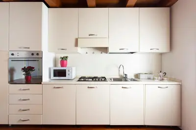 Cucina o angolo cottura di Comodo Apt Centrale
