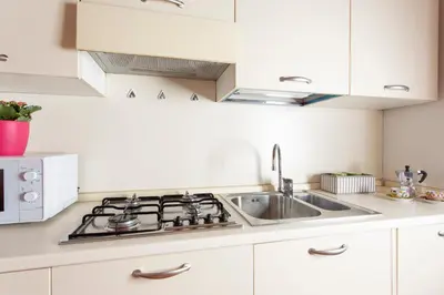 Cucina o angolo cottura di Comodo Apt Centrale