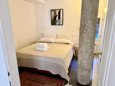 Letto o letti in una camera di Ca Penini - canal view