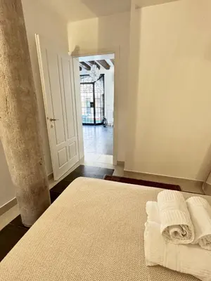 Letto o letti in una camera di Ca Penini - canal view