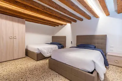 Letto o letti in una camera di Ca' Superba