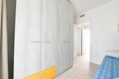 Letto o letti in una camera di Wave Plus Apartments