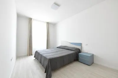 Letto o letti in una camera di Wave Plus Apartments
