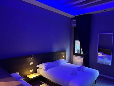 Letto o letti in una camera di Ca' Piasentin