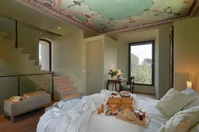 Letto o letti in una camera di Massimago Wine Tower