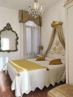 Letto o letti in una camera di Romantica suite veneziana