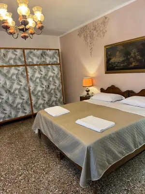 Letto o letti in una camera di Lions Venice Guest house