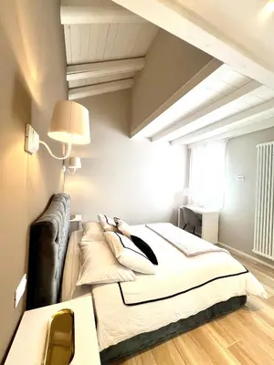 Letto o letti in una camera di Vanessa Home