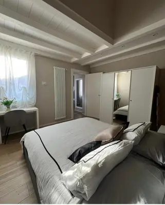 Letto o letti in una camera di Vanessa Home