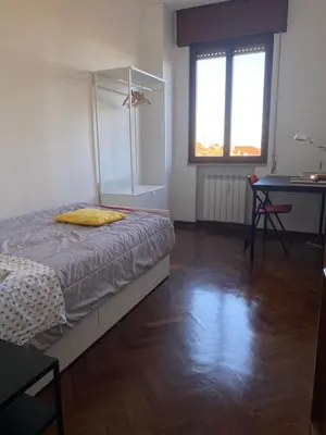 Letto o letti in una camera di Ca' Beuys In The Kitchen Apartment