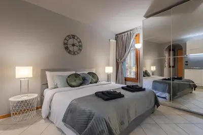Letto o letti in una camera di Charme Studio - Parcheggio a 20 Mt - 5 min dalla Fiera di Vicenza