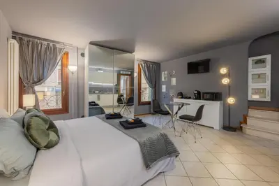 Letto o letti in una camera di Charme Studio - Parcheggio a 20 Mt - 5 min dalla Fiera di Vicenza