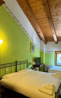 Letto o letti in una camera di Locanda al Convento
