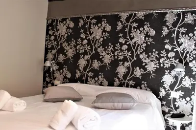 Letto o letti in una camera di Hotel Rio