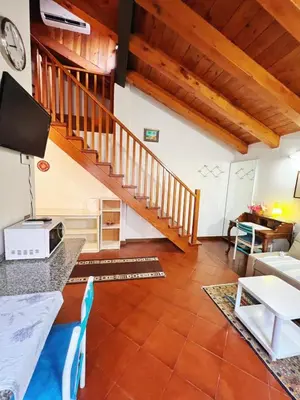 TV o dispositivi per l'intrattenimento presso Holiday Treviso Suite Venezia