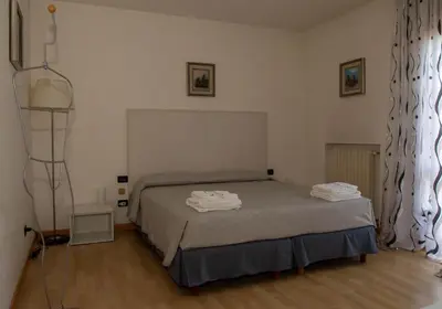 Letto o letti in una camera di Bed and Breakfast La Sosta