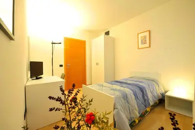 Letto o letti in una camera di Bed and Breakfast La Sosta