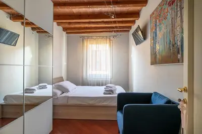 Letto o letti in una camera di Casa Moretta - Padova Santa Sofia