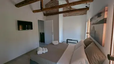 Letto o letti in una camera di Casa Rosabianca