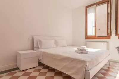 Letto o letti in una camera di Celestia Castello by waterbus