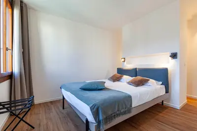 Letto o letti in una camera di SAN LORENZO APARTMENTS 5054