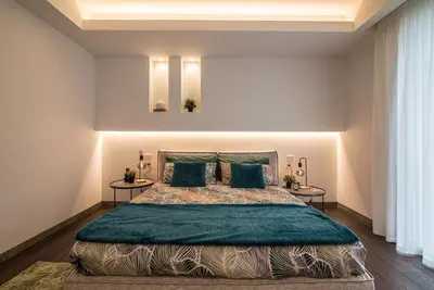 Letto o letti in una camera di STIMAHome villa con piscina privata