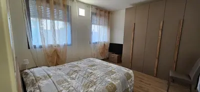 Letto o letti in una camera di Locazione La Scacchiera