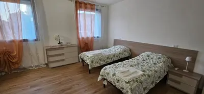 Letto o letti in una camera di Locazione La Scacchiera