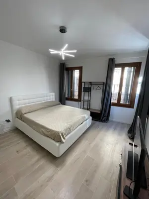 Letto o letti in una camera di Appartamento Domus