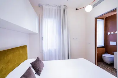 Letto o letti in una camera di Palazzetto San Stin Up to 5 Guests Renewed in 2024