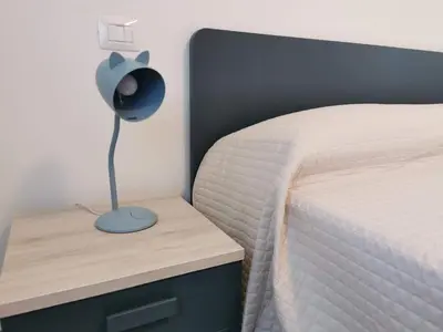 Letto o letti in una camera di Appartamenti Vanin Ca' di Valle