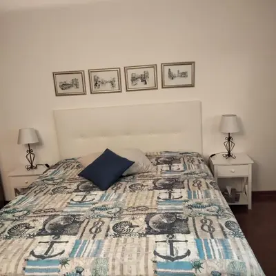 Letto o letti in una camera di Casa del Capitano