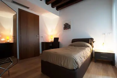 Letto o letti in una camera di The Lion's House APT2