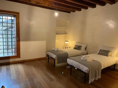 Letto o letti in una camera di Il Campanile