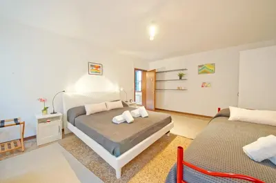 Letto o letti in una camera di Cà Square San Marco 425