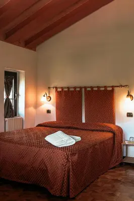 Letto o letti in una camera di Hotel Liberty