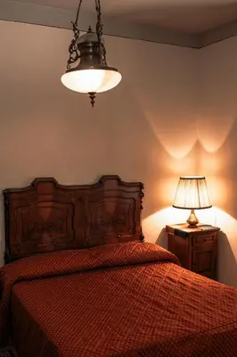 Letto o letti in una camera di Hotel Liberty