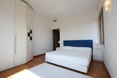 Letto o letti in una camera di Grand Canal Terrace Palace