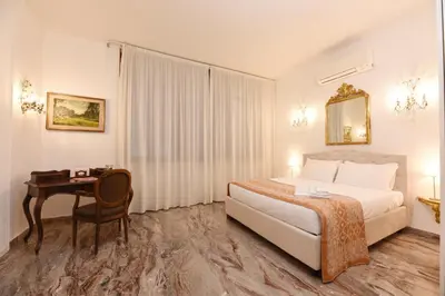 Letto o letti in una camera di Soderini Splendor: First Floor Palazzo Charm at Castello Square