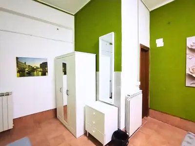 Letto o letti in una camera di Pavarotti