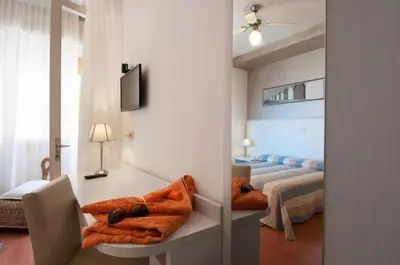 Letto o letti in una camera di Hotel Telenia