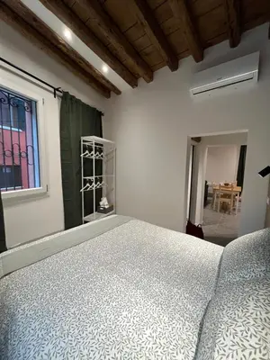 Letto o letti in una camera di Ca'Mara Appartamento Venezia Biennale