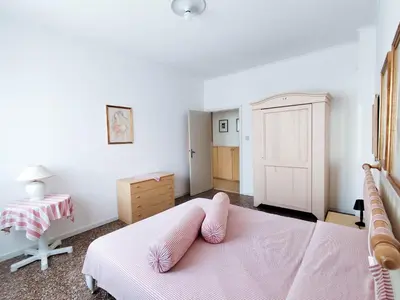 Letto o letti in una camera di CONDOMINIO GUSSO