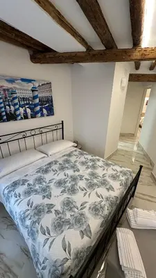 Letto o letti in una camera di Ca lucia Canal View