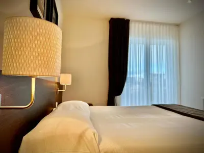 Letto o letti in una camera di Residenza Roma Marina 2